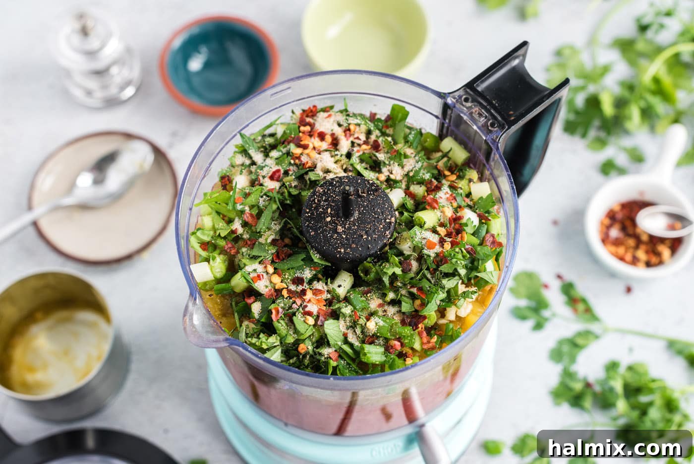 ingredients for restaurant style salsa in a food processor