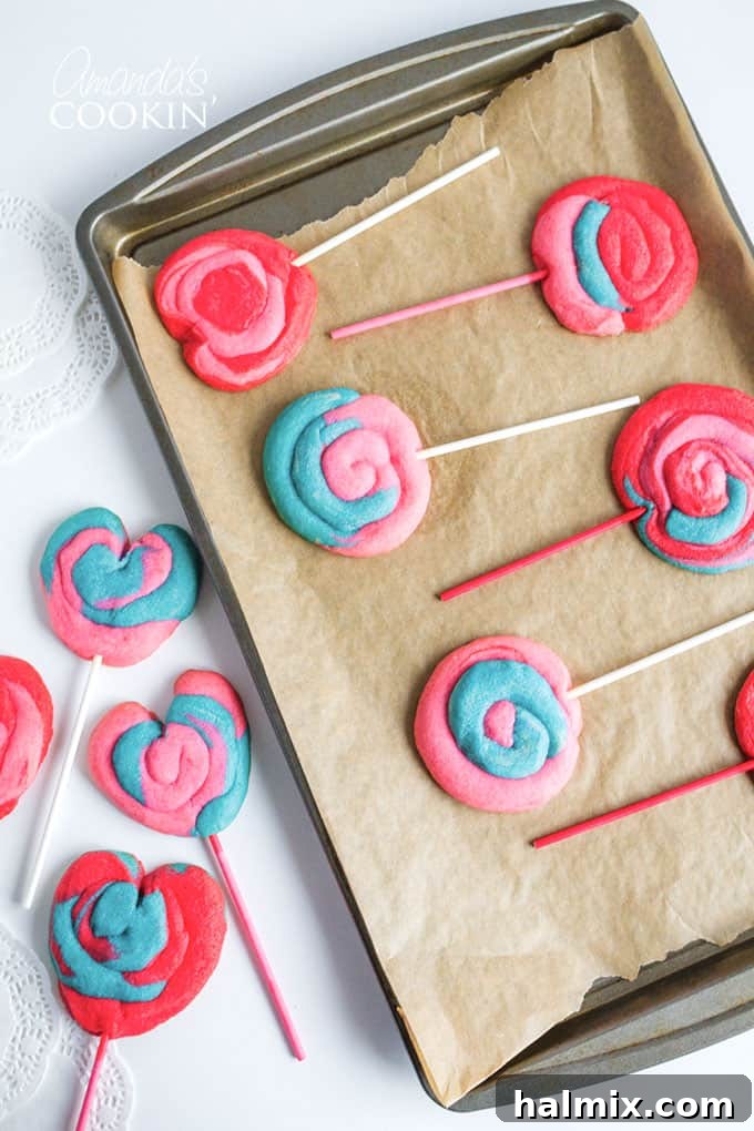 Sweetheart Play Dough Cookie Pops 2 Valentine Play Dough Cookie Pops on a baking pan, displaying vibrant colors