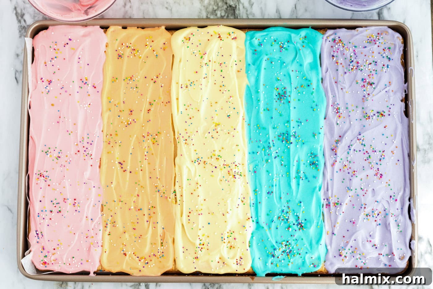 Frosted Sugar Cookie Bars: The Easiest Way to Indulge 12 Frosted Sugar Cookie Bars topped with sprinkles
