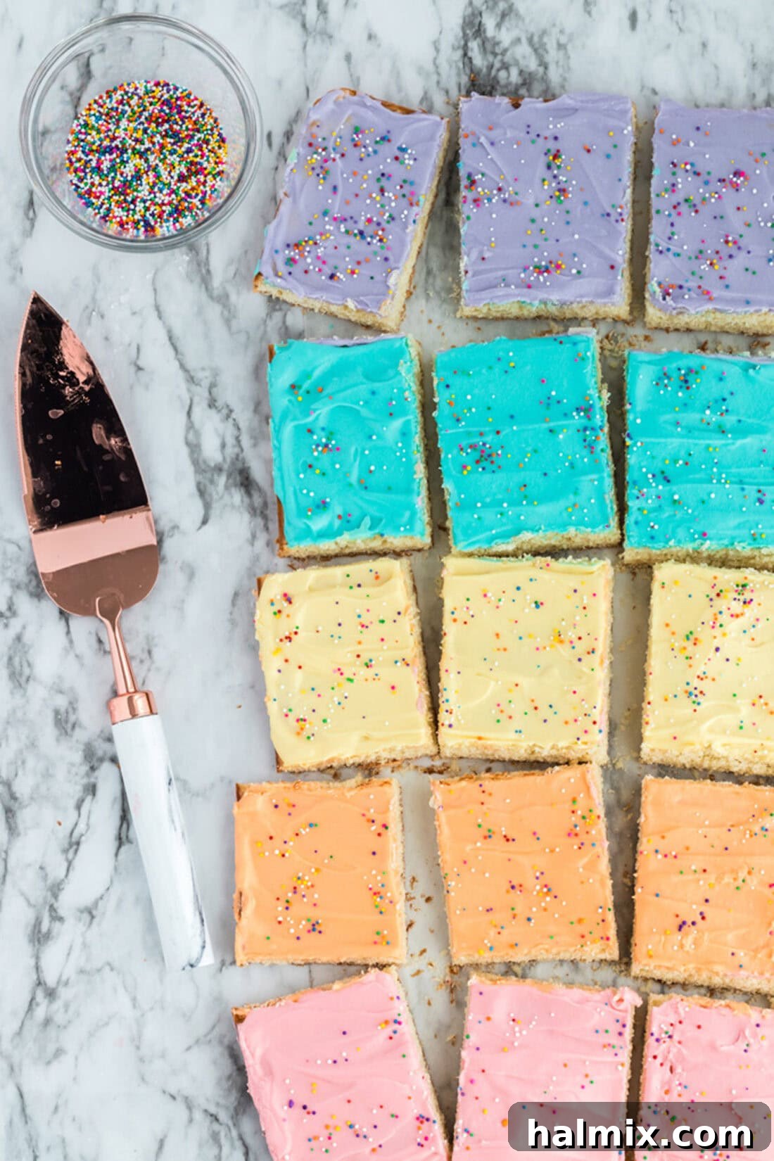 Frosted Sugar Cookie Bars: The Easiest Way to Indulge 3 Frosted Sugar Cookie Bars resting on a table