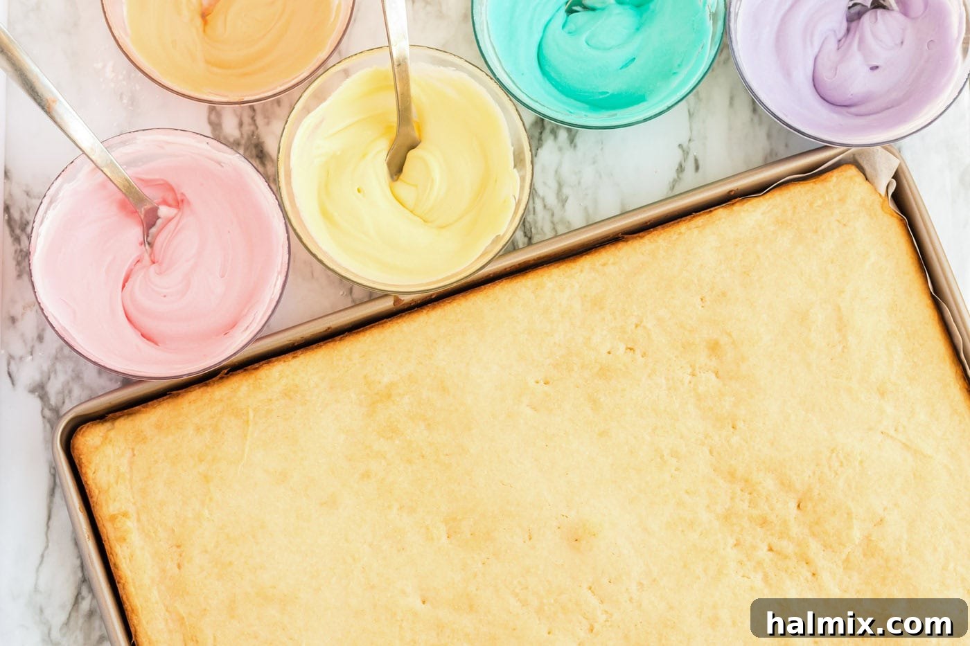 Frosted Sugar Cookie Bars: The Easiest Way to Indulge 10 Jelly roll pan of sugar cookies and bowls of colored frosting