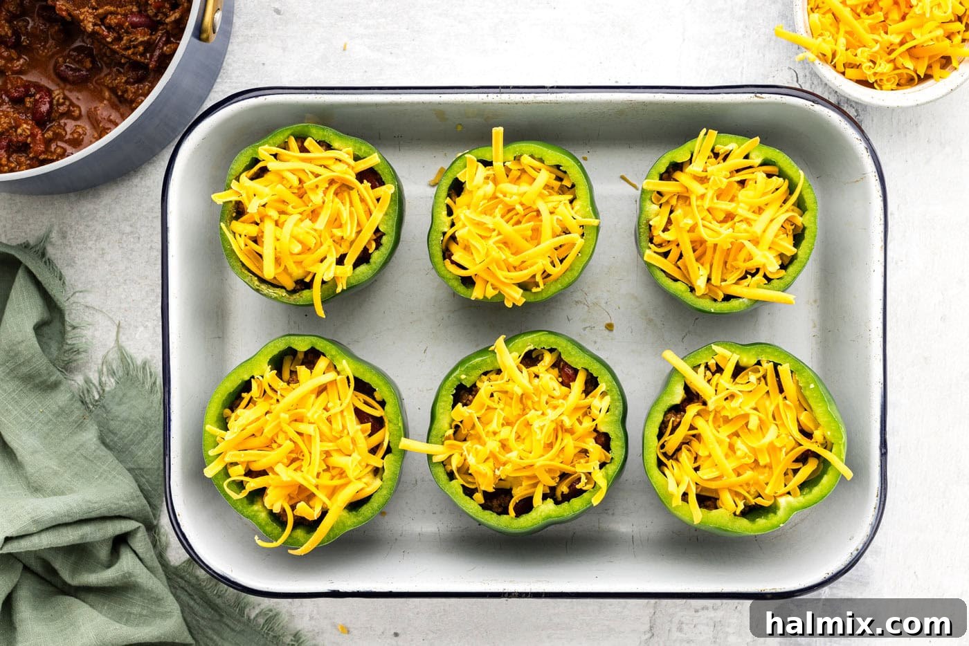 Southwest Chili Cornbread Stuffed Peppers 11 Shredded cheese sprinkled generously on top of the chili-stuffed peppers