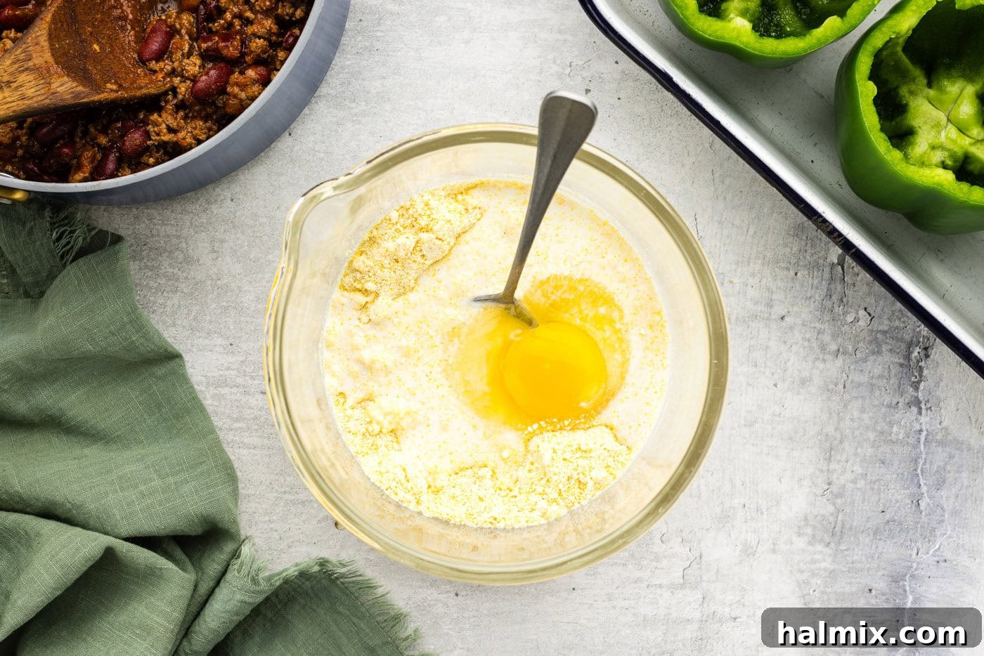 Southwest Chili Cornbread Stuffed Peppers 8 Cornbread mix in a bowl, ready to be prepared
