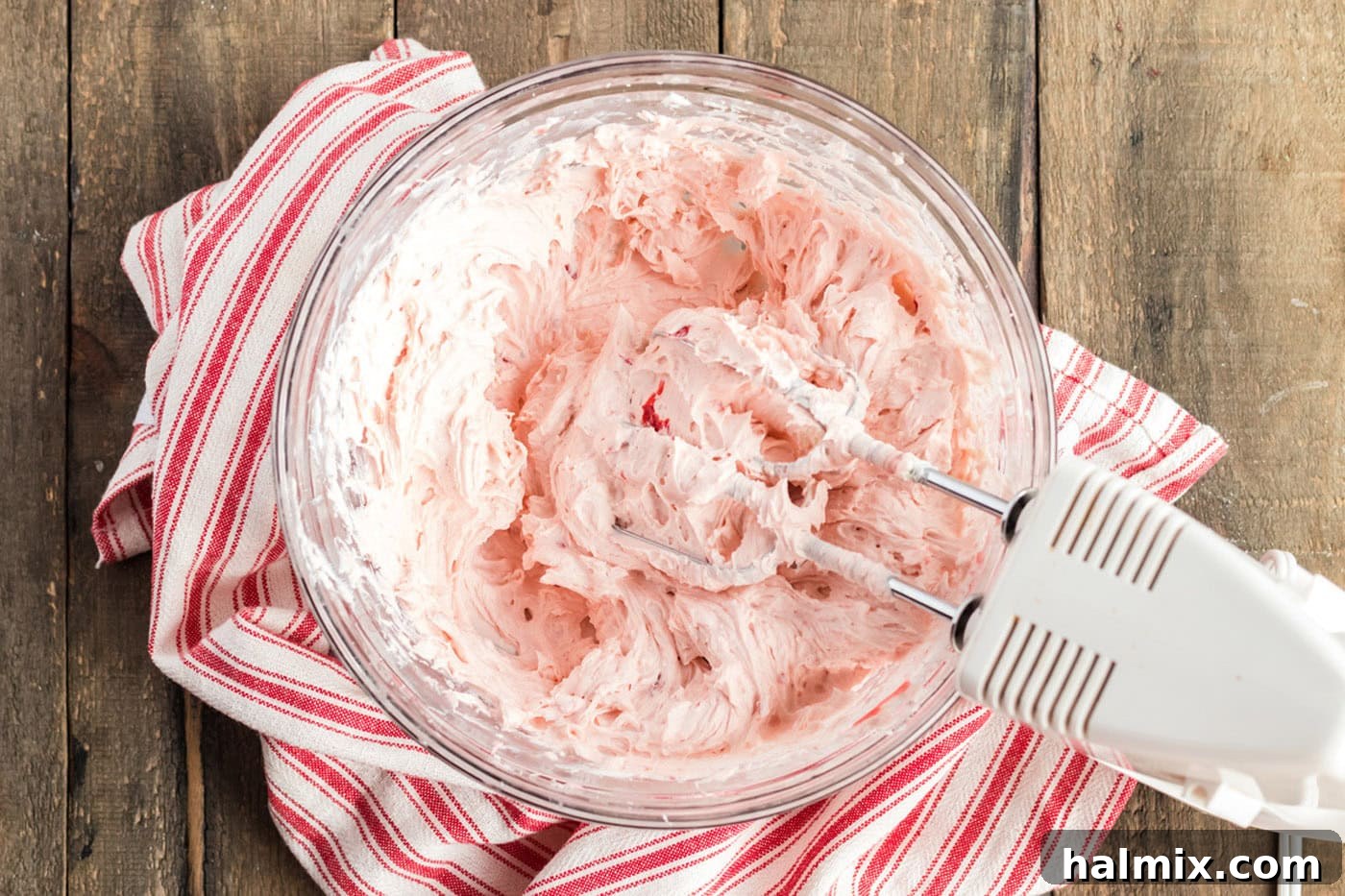 cherry pie filling and both extracts mixed into the cream cheese and butter mixture
