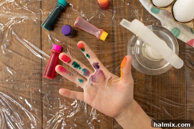 Groovy Tie Dye Easter Eggs Made Easy 2 Hand stained with food coloring, illustrating the messiness of the craft