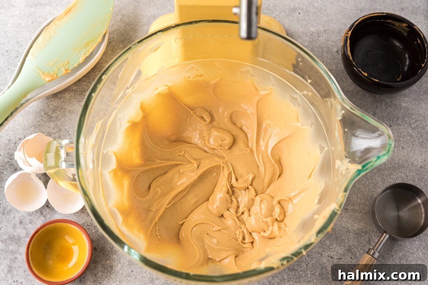 Overhead shot of creamy peanut butter and cream cheese mixture in a bowl, step 2