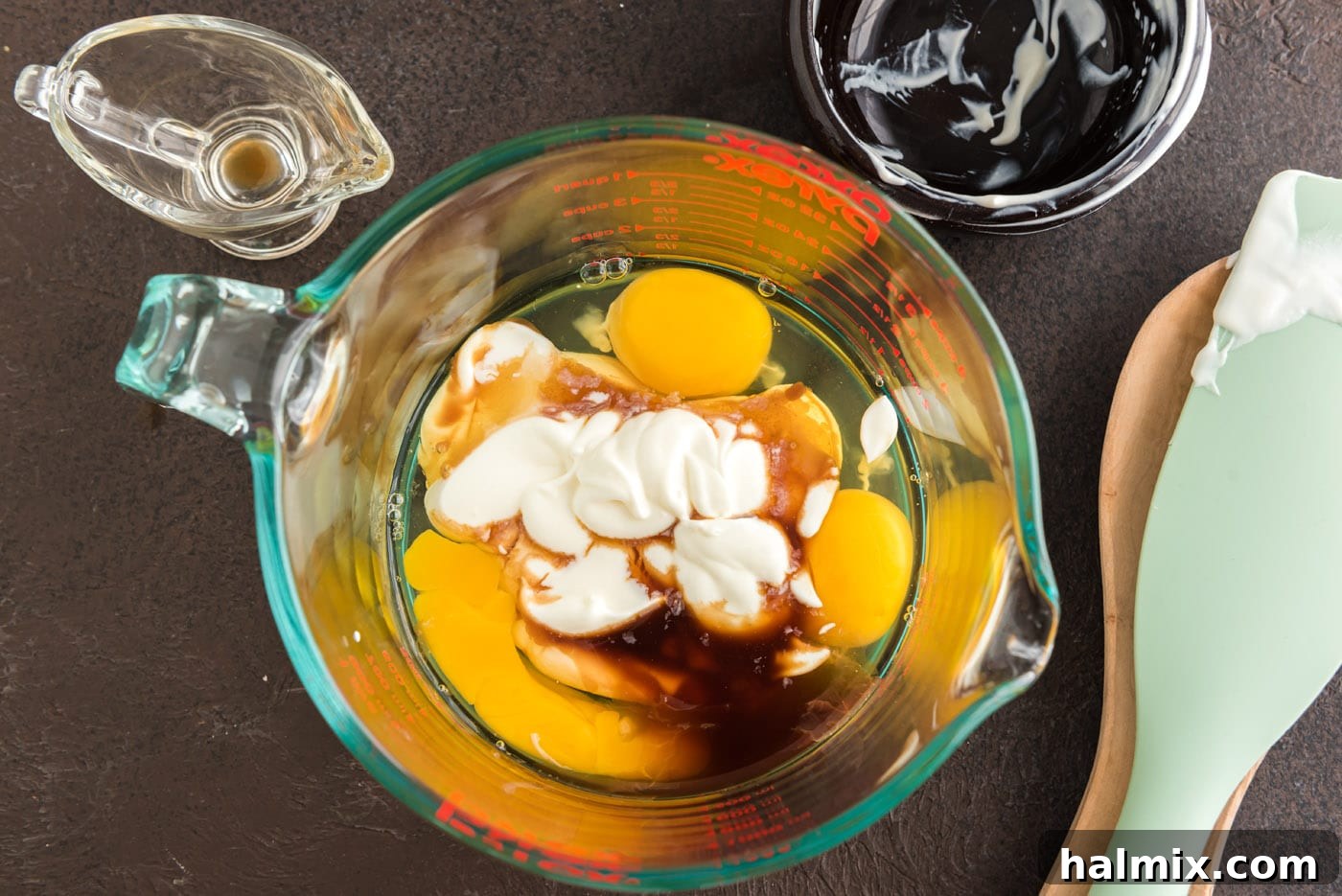 eggs, sour cream, and vanilla in a bowl