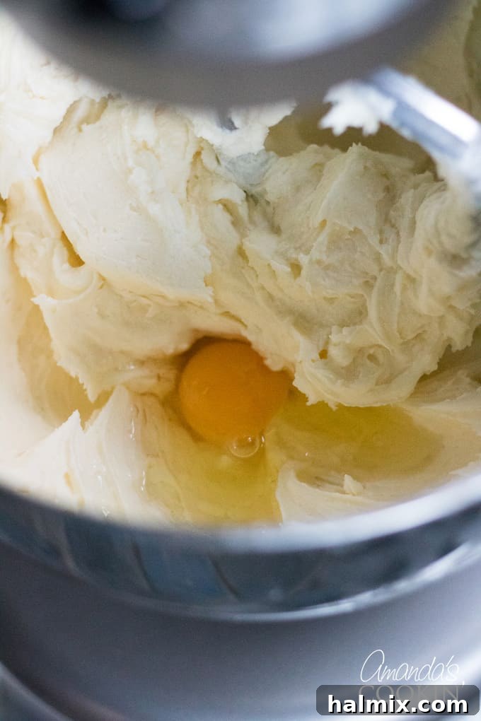 How to make Tiramisu Cheesecake: Beating mascarpone and cream cheese