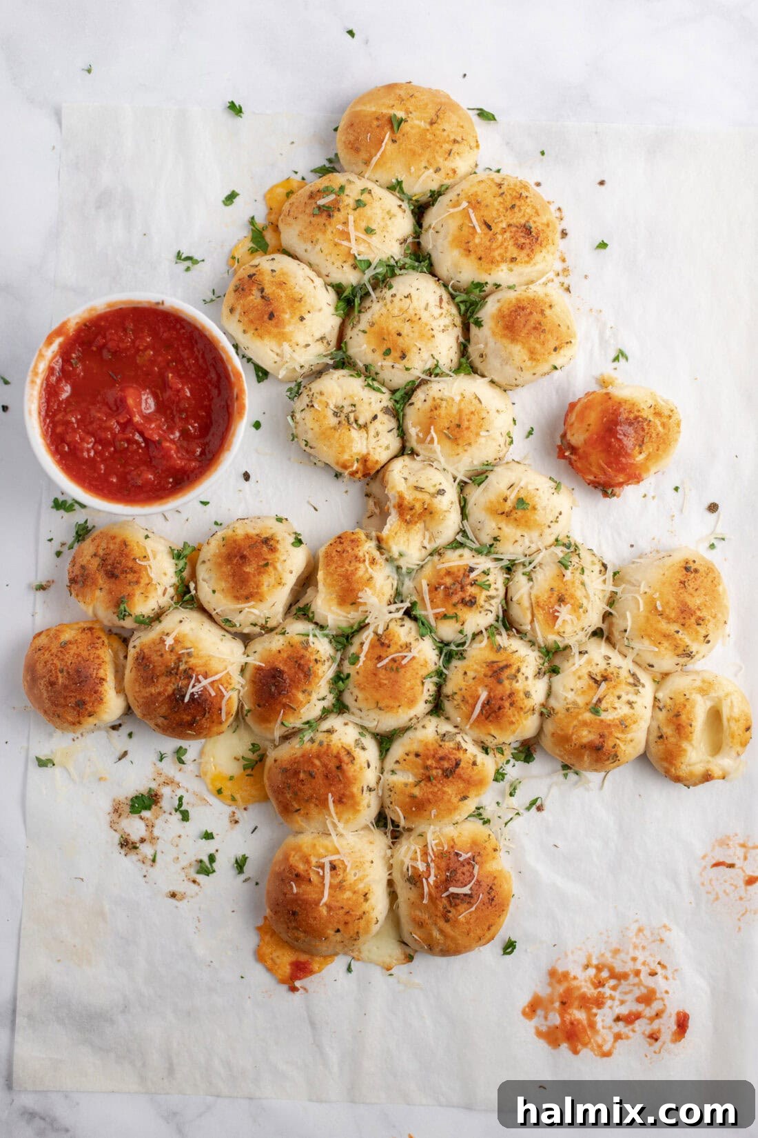 Festive Christmas Tree Pull-Apart Bread 11 Christmas Tree Pull Apart Bread with pieces removed