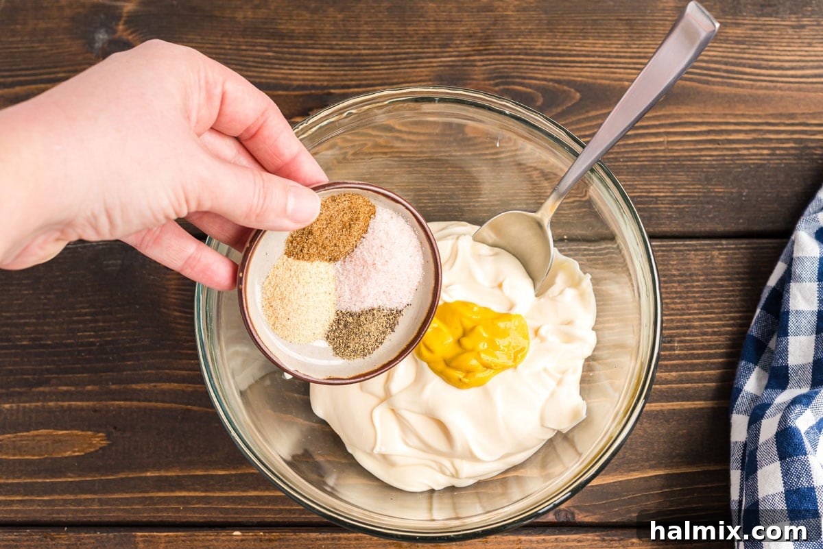 Mama's Secret Potato Salad 4 adding seasoning to mayo and mustard
