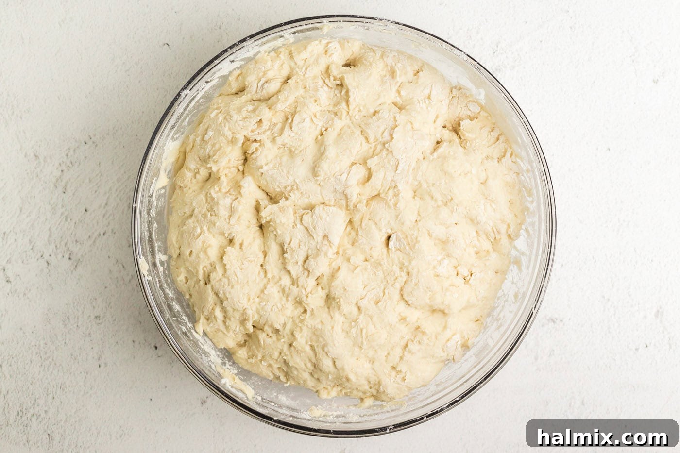 Golden Air Fried Pretzel Poppers 8 Dough in a bowl, covered with a towel