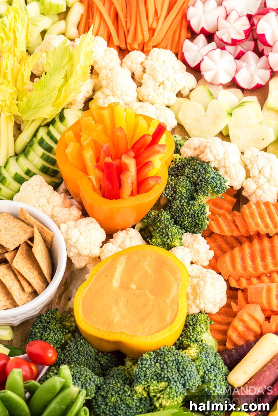 Edible Sculptures: Crafting Decorative Vegetables 3 An artistic display of colorful, cut raw vegetables on a serving board, showcasing various preparation techniques.