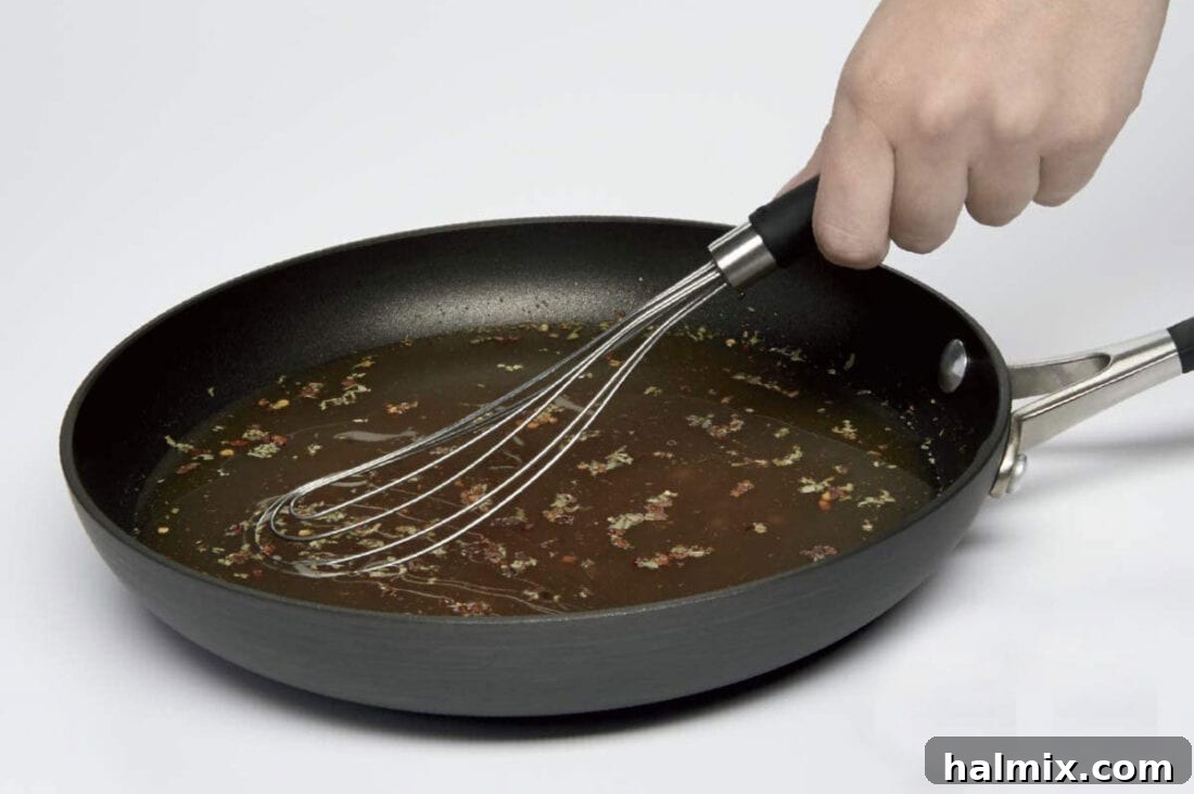 21 Clever Kitchen Gadgets You'll Use Constantly 14 A flat wire whisk in a frying pan, ideal for stirring sauces and preventing ingredients from sticking.