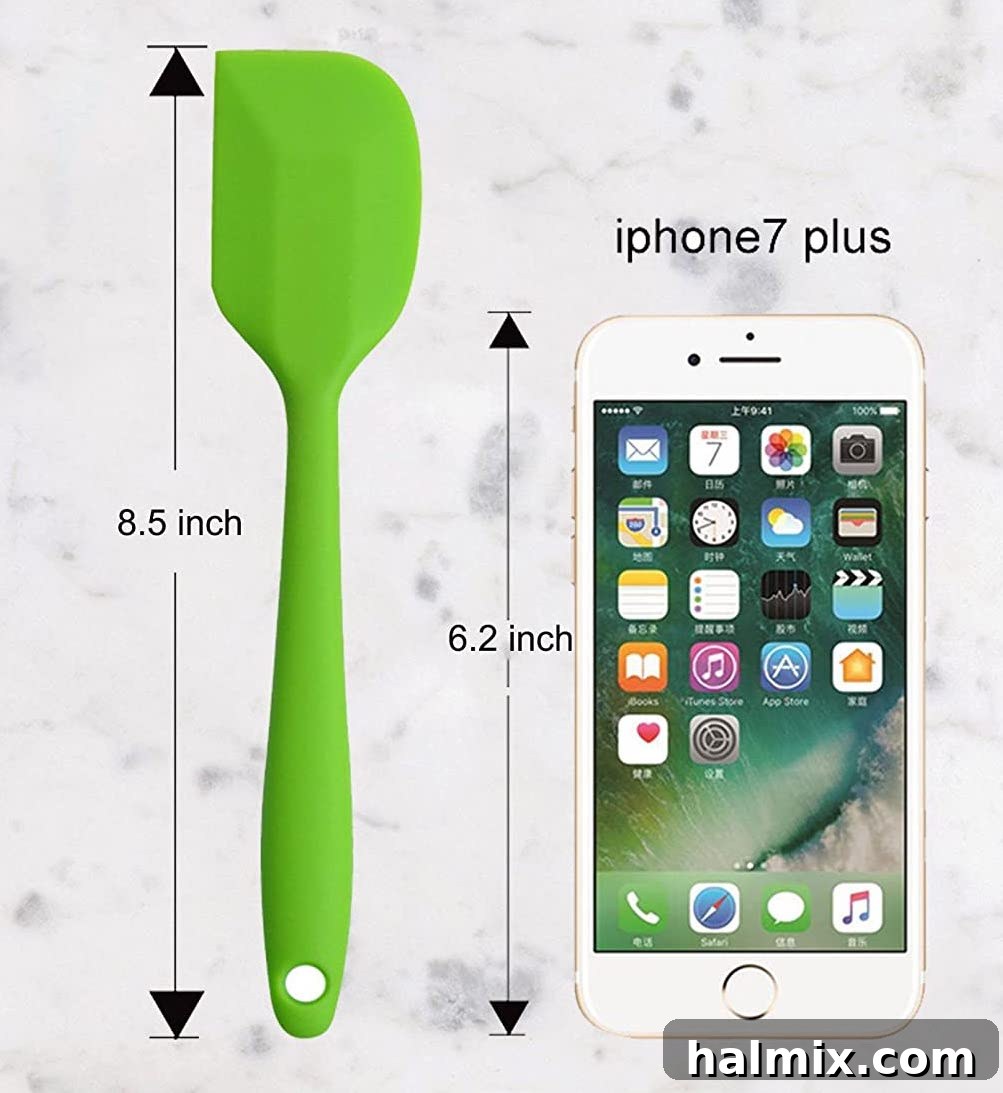 21 Clever Kitchen Gadgets You'll Use Constantly 16 Small rubber spatulas displayed next to a smartphone, emphasizing their compact size and utility.