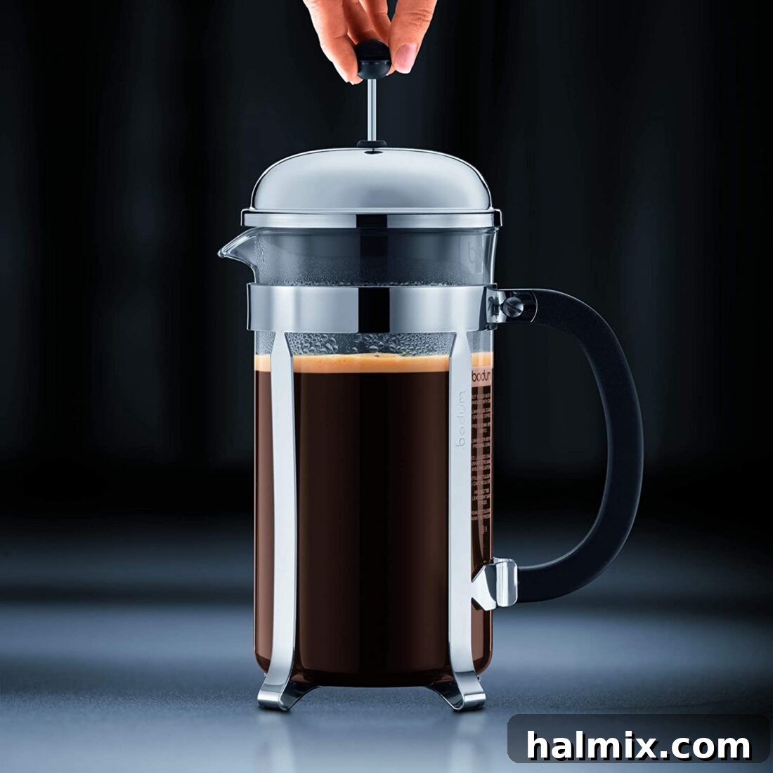 21 Clever Kitchen Gadgets You'll Use Constantly 21 A French press coffee maker with freshly brewed coffee, highlighting its classic method for rich coffee.