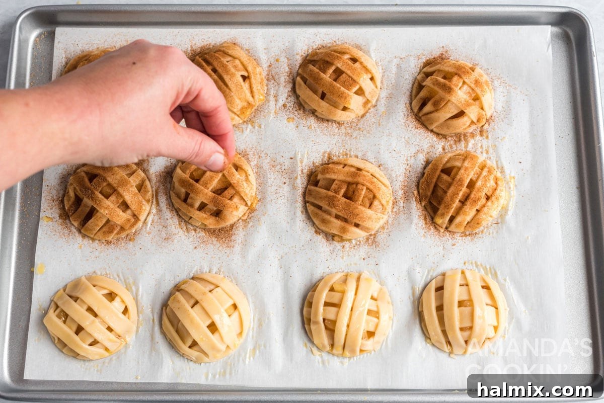 adding cinnamon sugar to pie dough