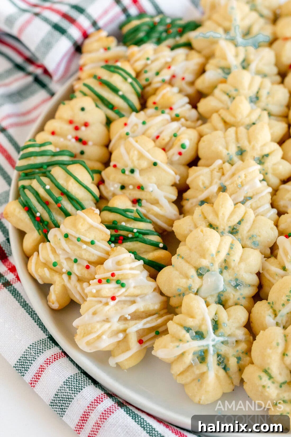 artistic arrangement of spritz cookies on a decorative plate