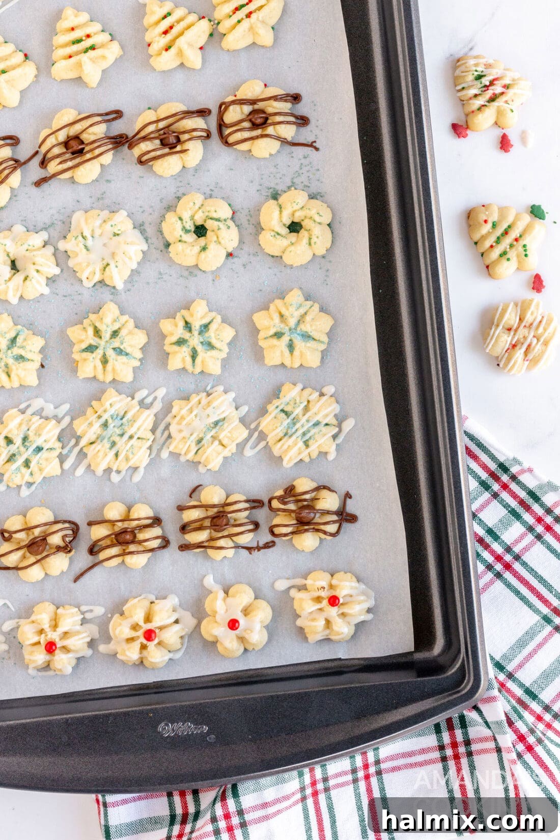 baking sheet of freshly pressed spritz cookies, before baking