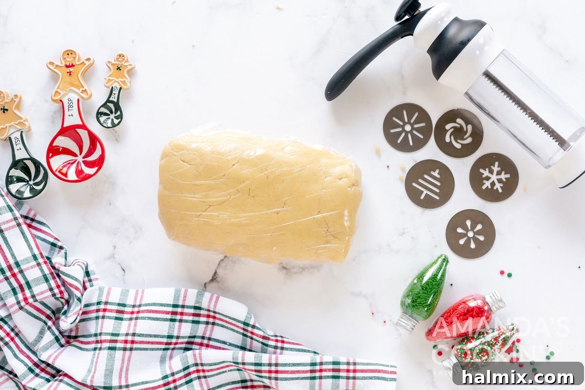 cookie dough wrapped in plastic wrap, chilling in the fridge