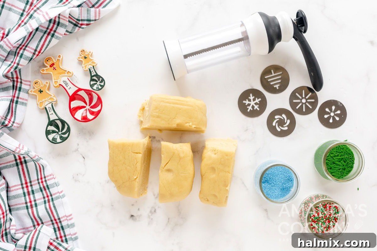 cookie dough cut into manageable pieces for the cookie press
