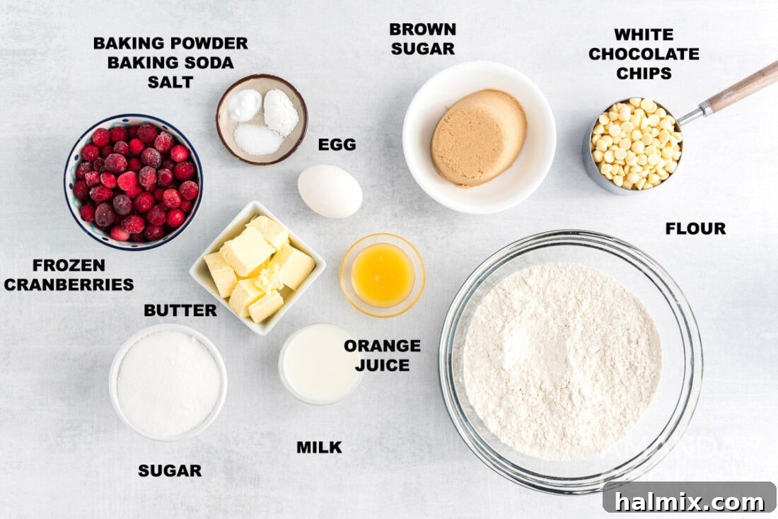 Sweet-Tart White Chocolate Cranberry Delights 4 Clearly labeled ingredients laid out for making White Chocolate Cranberry Cookies.