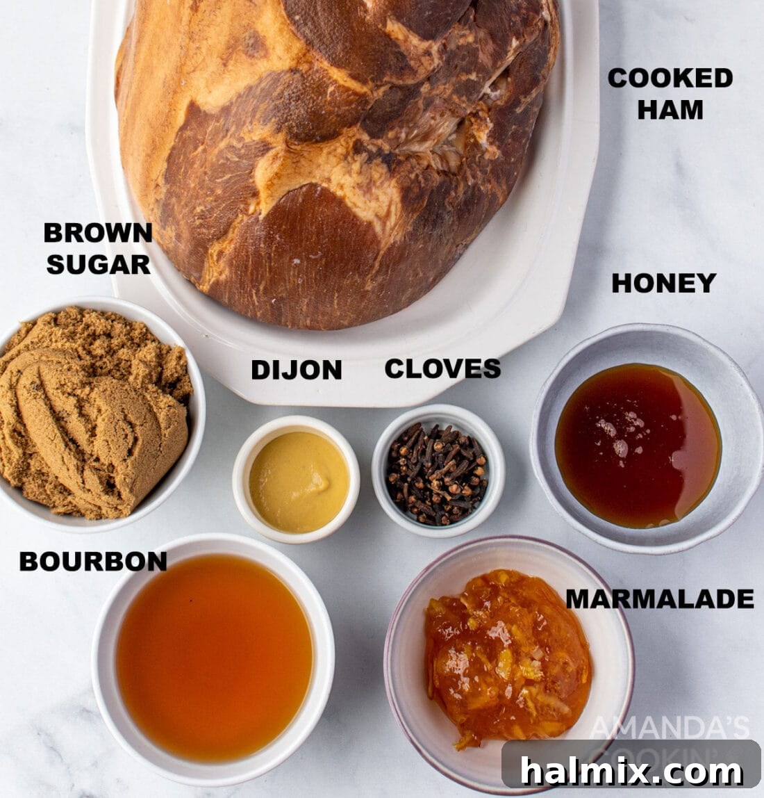 Labeled ingredients for the bourbon orange ham glaze including bourbon, brown sugar, honey, orange marmalade, and Dijon mustard
