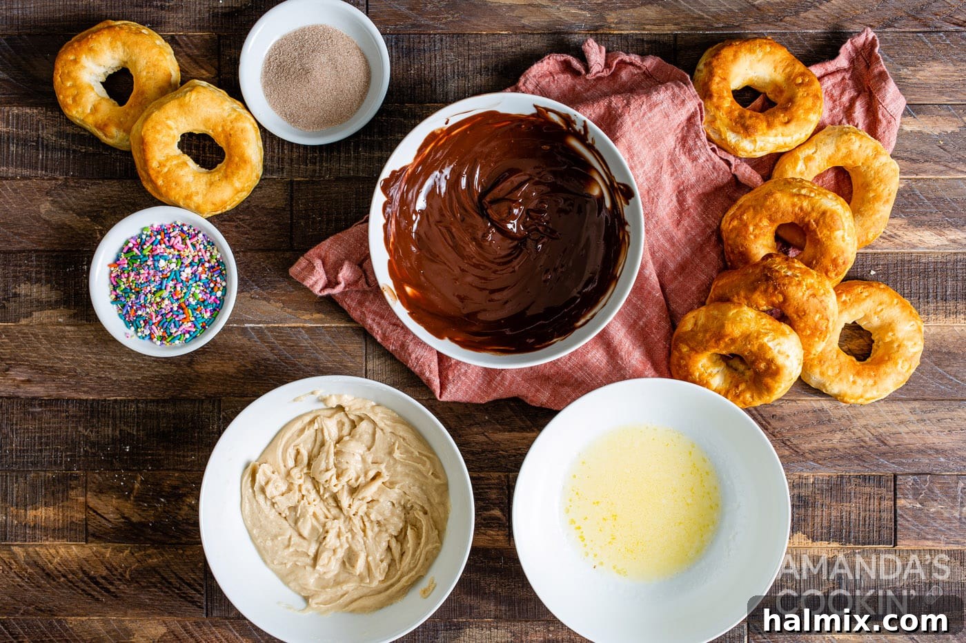 various donut toppings in bowls, prepped and ready
