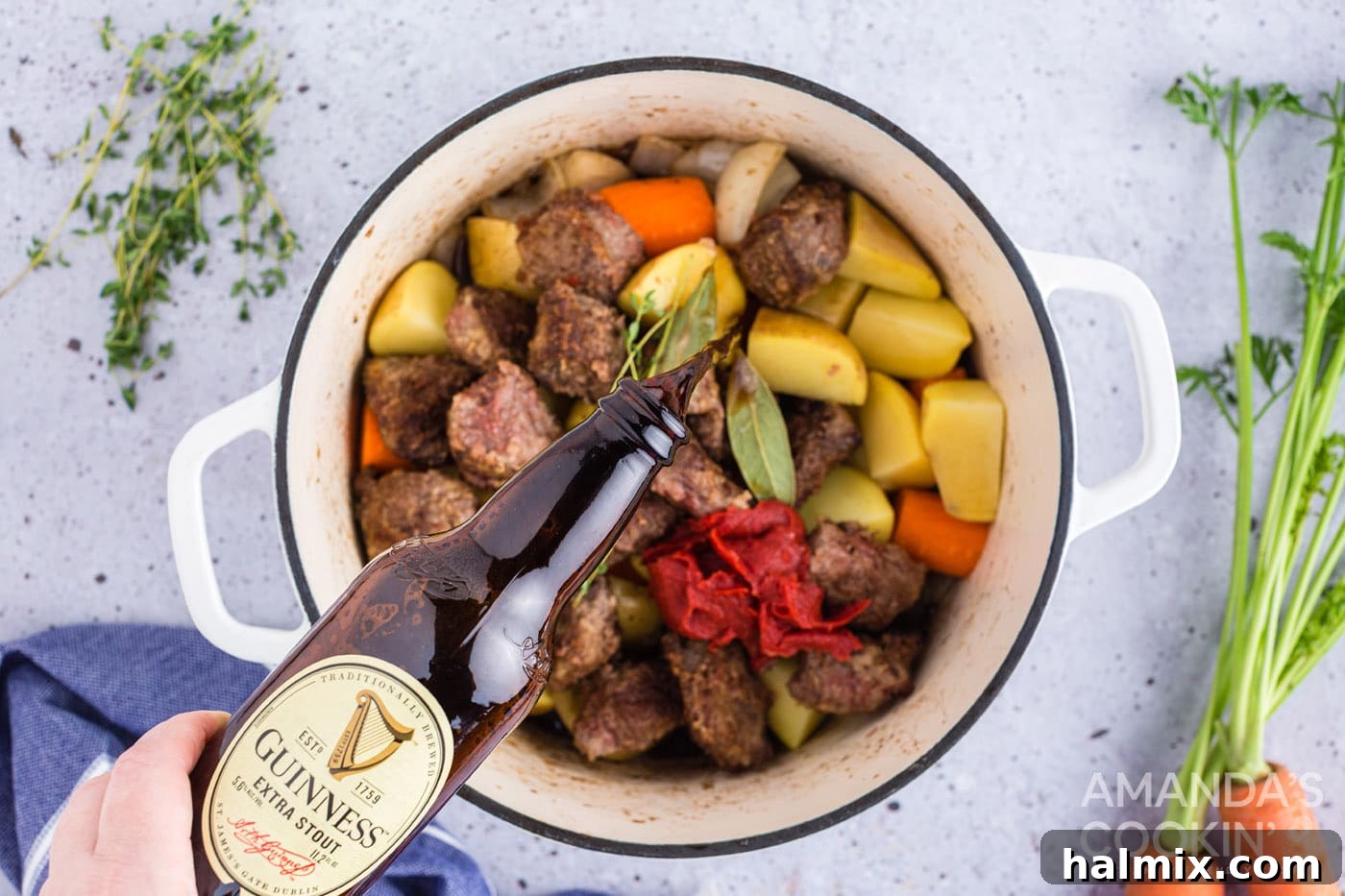 add beer and beef broth to pot with meat and veggies