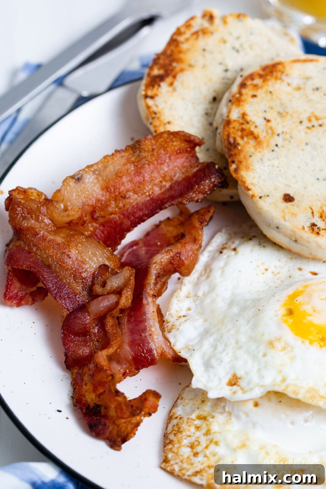 bacon on plate with eggs