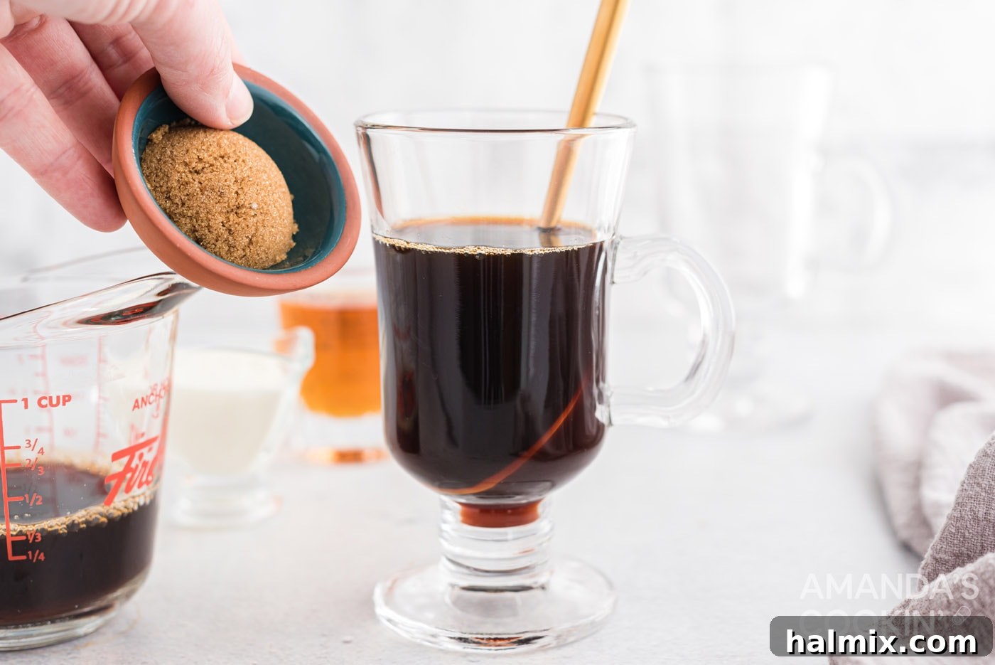 adding brown sugar to coffee