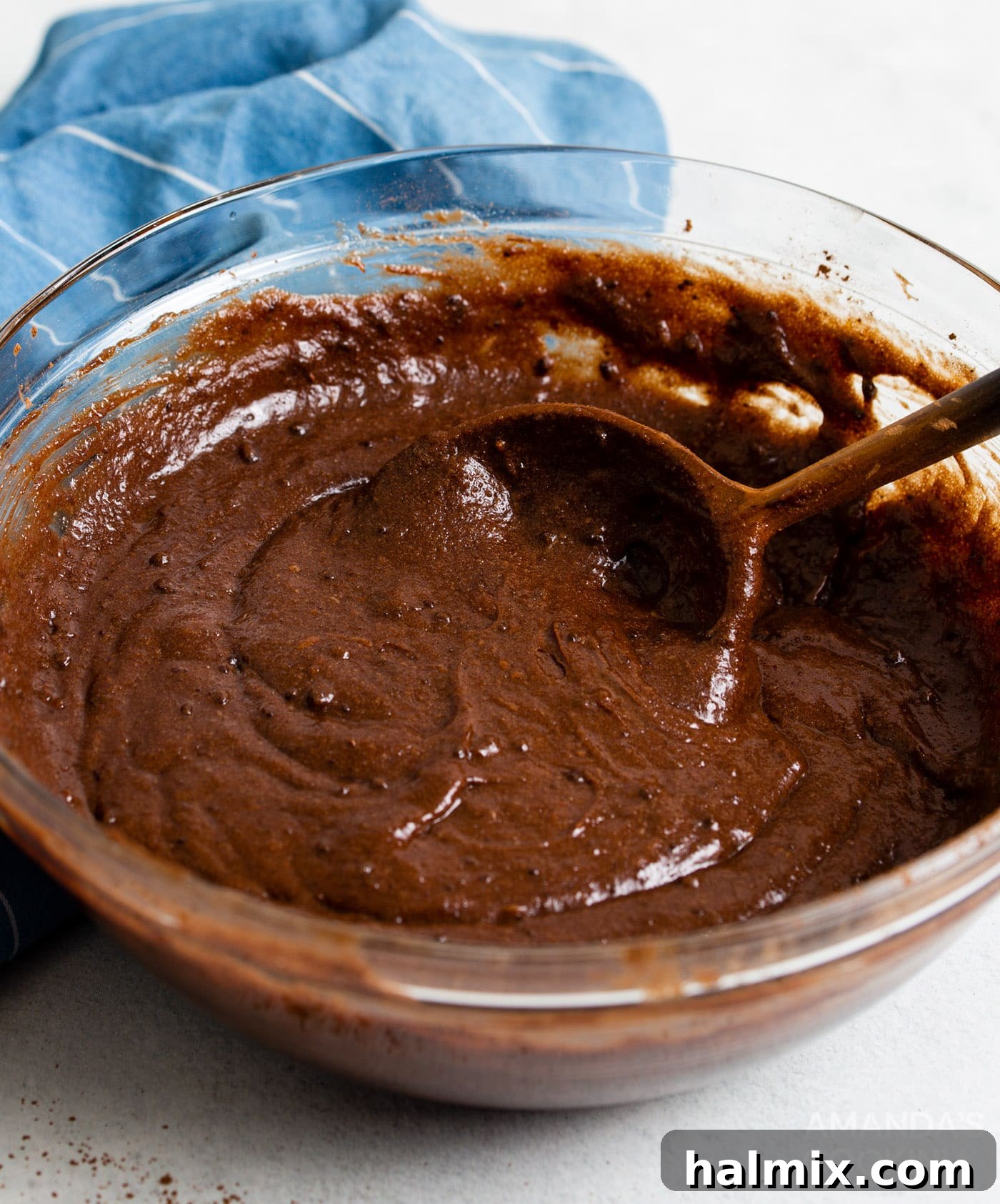 Rich brownie batter in a mixing bowl, perfectly combined and ready for the next step.