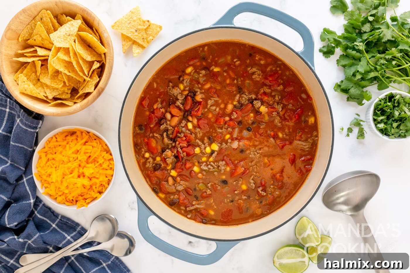Close-up of the simmering taco soup, rich with vibrant ingredients, indicating the flavors are melding.