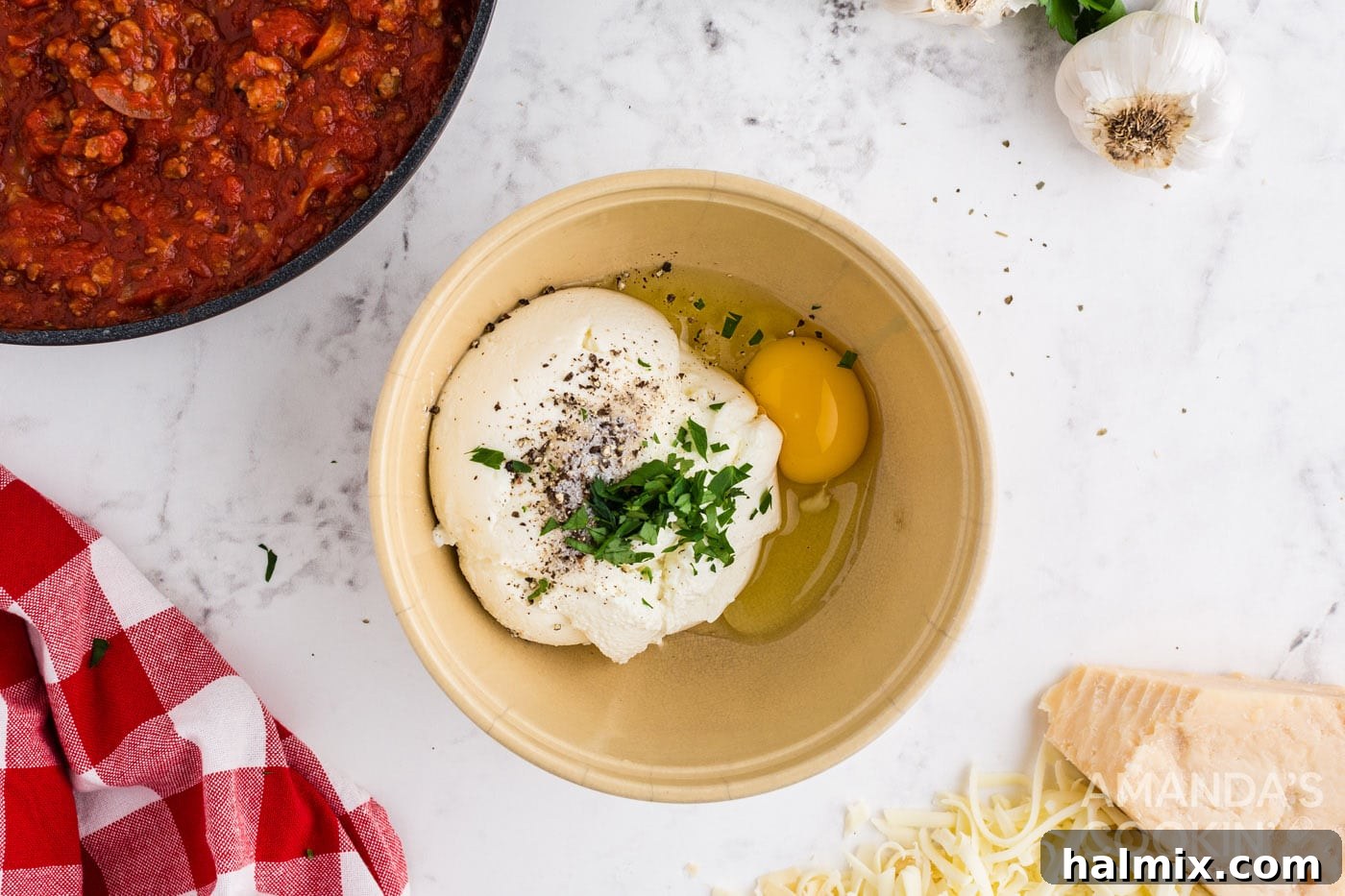 Ricotta cheese, egg, and seasonings blended in a bowl