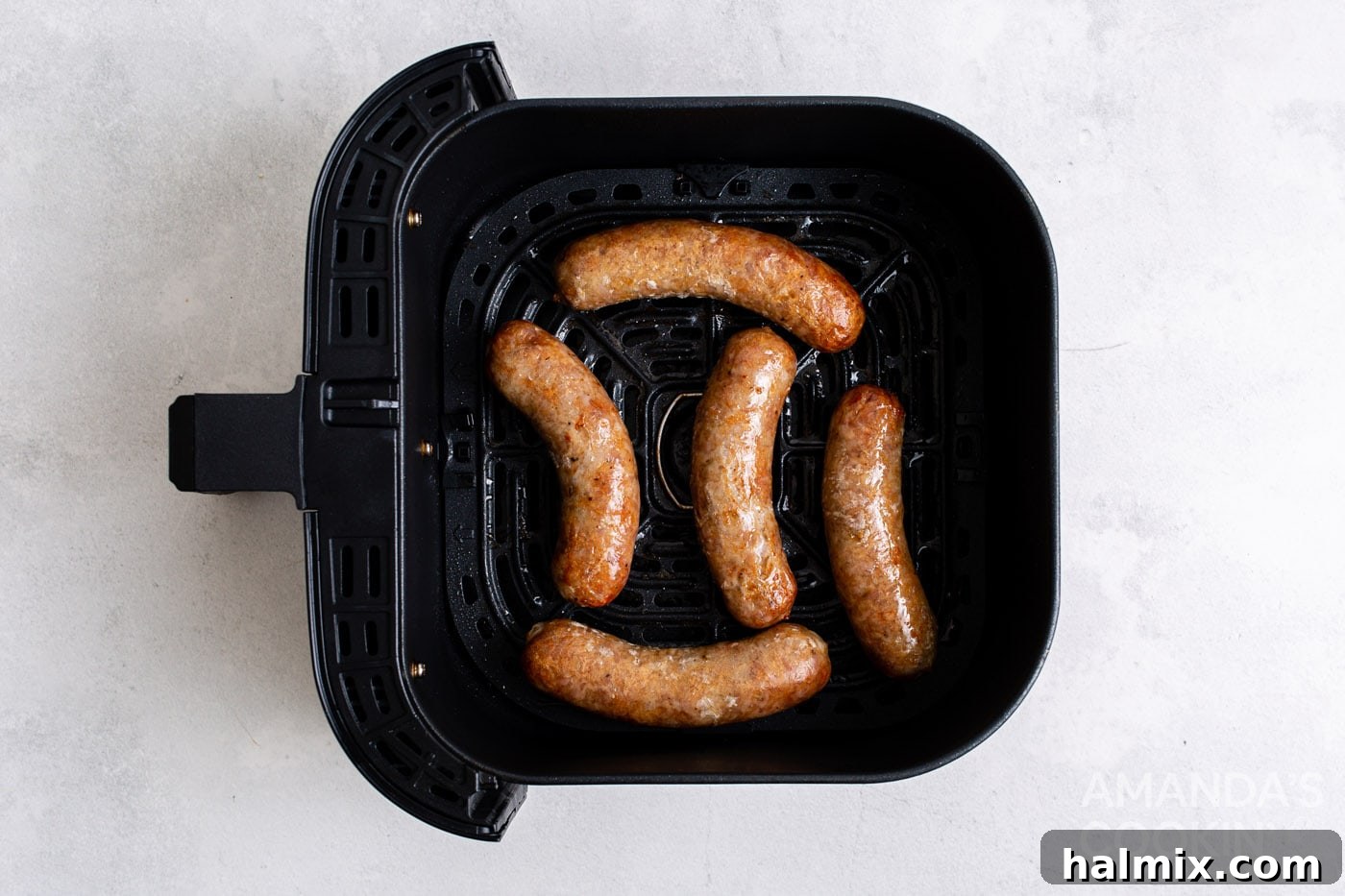 Perfect Air Fryer Bratwurst 6 cooked bratwurst in an air fryer