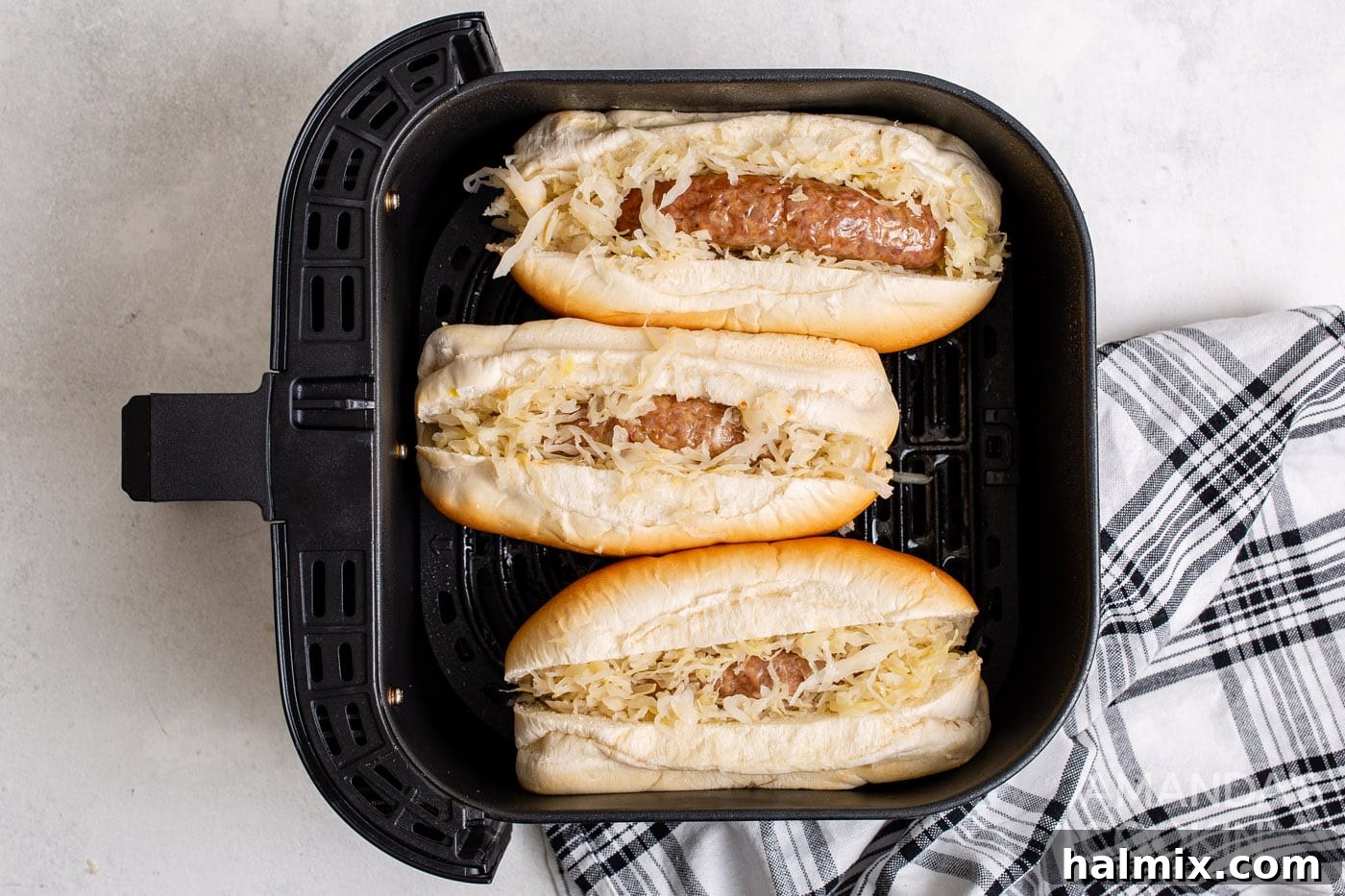 Perfect Air Fryer Bratwurst 7 sauerkrat and on bratwurst with buns