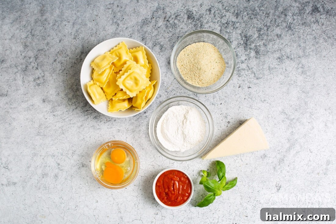 Crispy Golden Air Fryer Ravioli 4 All ingredients laid out on a wooden surface: ravioli, flour, eggs, Italian seasoned breadcrumbs, and parmesan cheese.