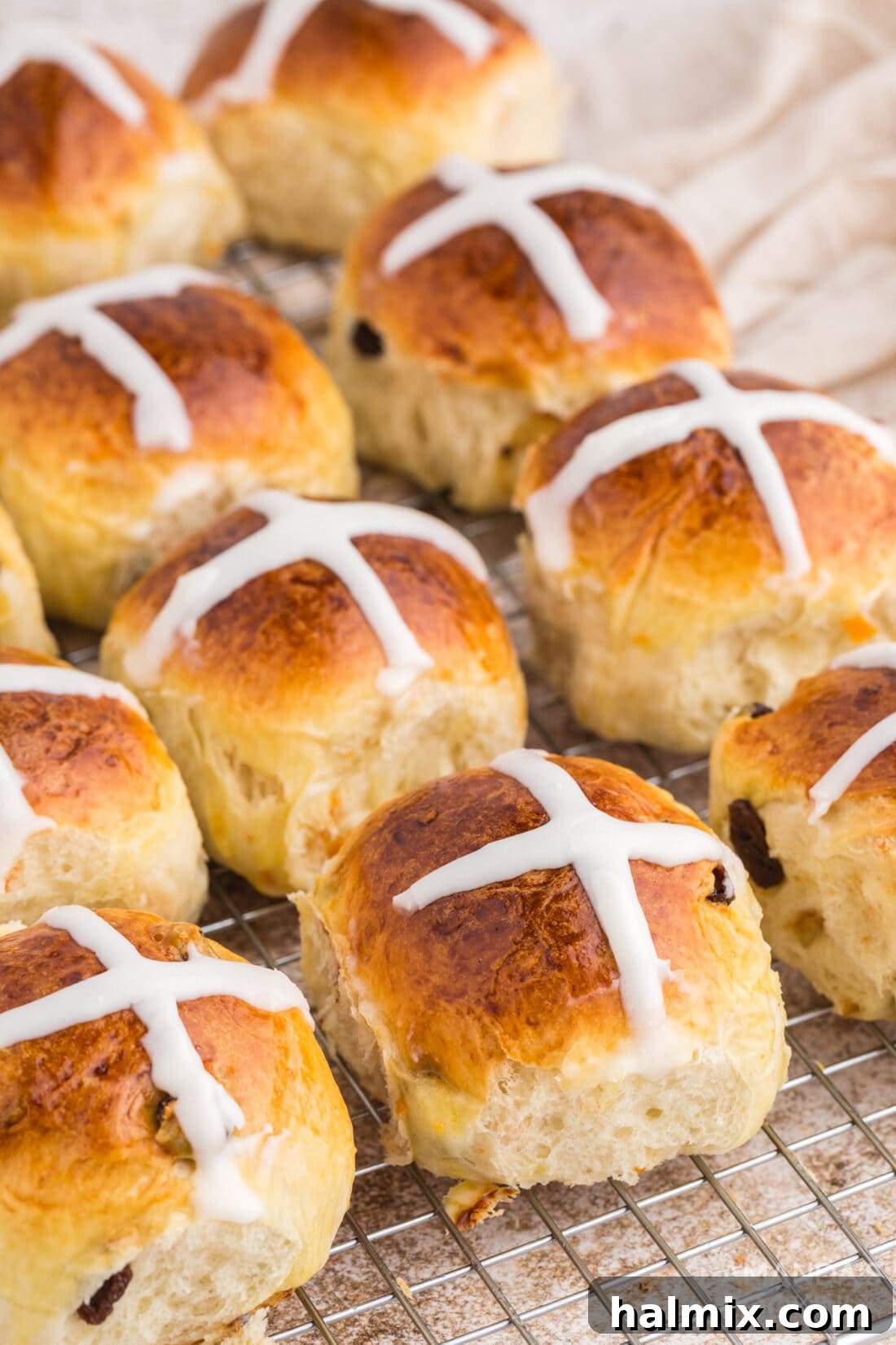 Spiced Easter Delights 2 Freshly baked Hot Cross Buns cooling on a wire rack