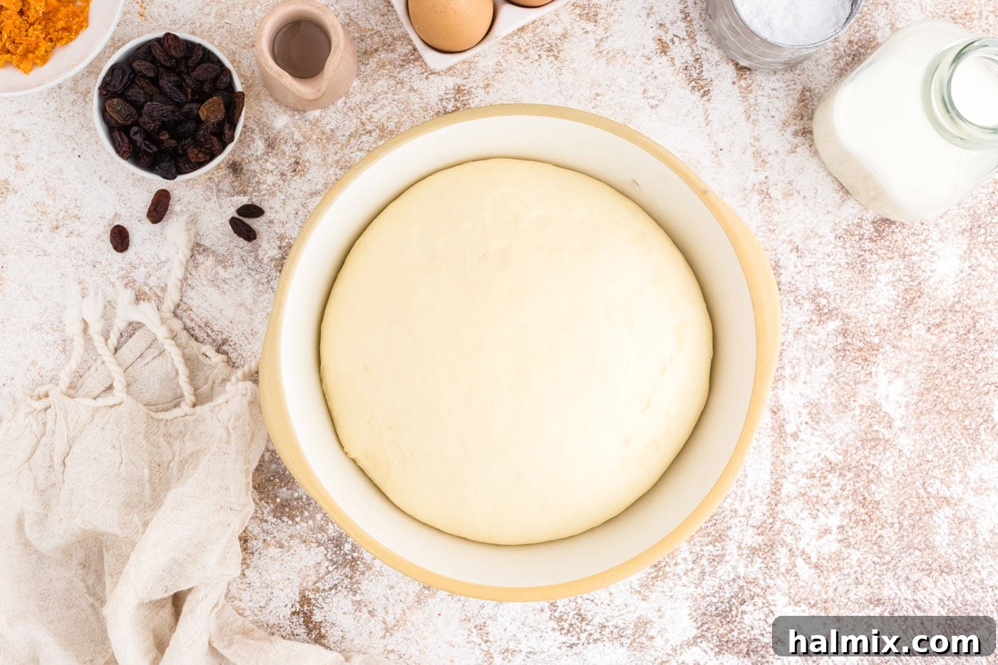 Spiced Easter Delights 11 Large dough ball doubled in size after rising in a bowl