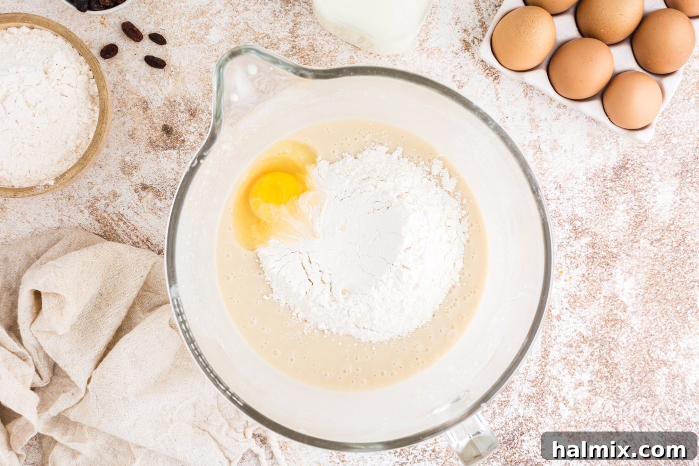 Spiced Easter Delights 8 Egg and two cups of flour added to the mixer bowl