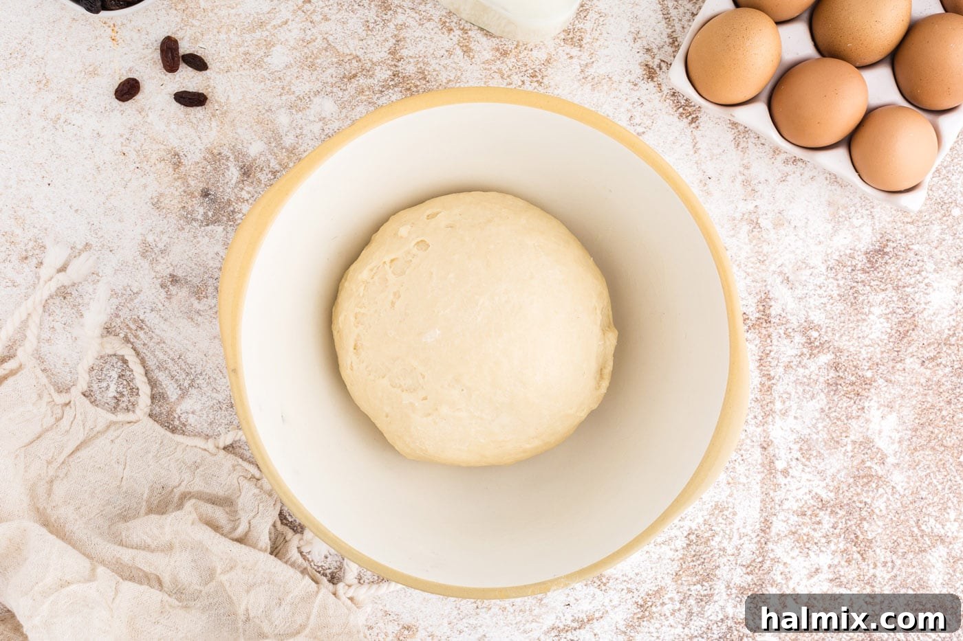 Spiced Easter Delights 10 Greased dough ball in a bowl before rising