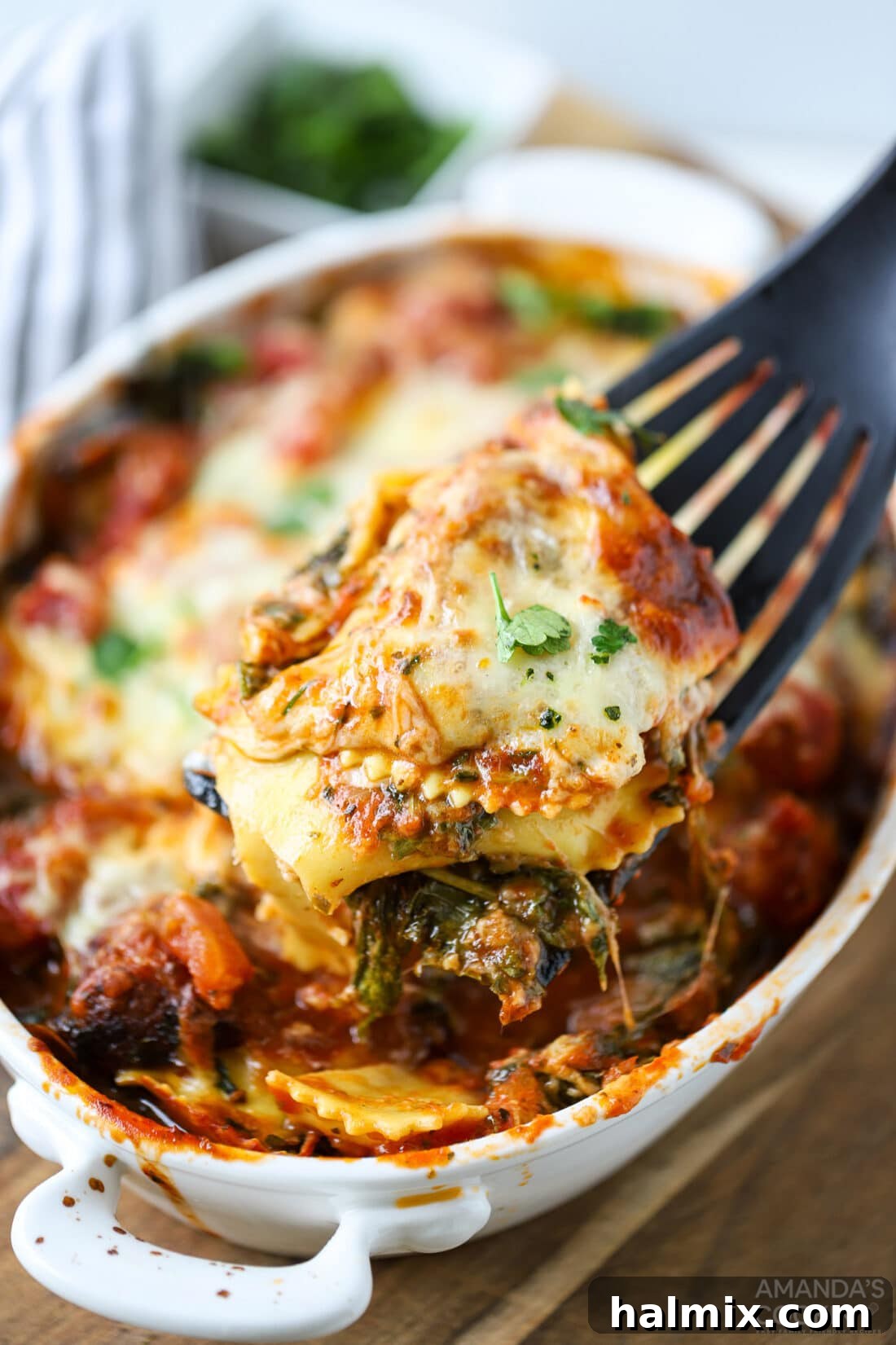 Bubbly golden-brown Cheesy Ravioli Lasagna casserole, perfect comfort food.