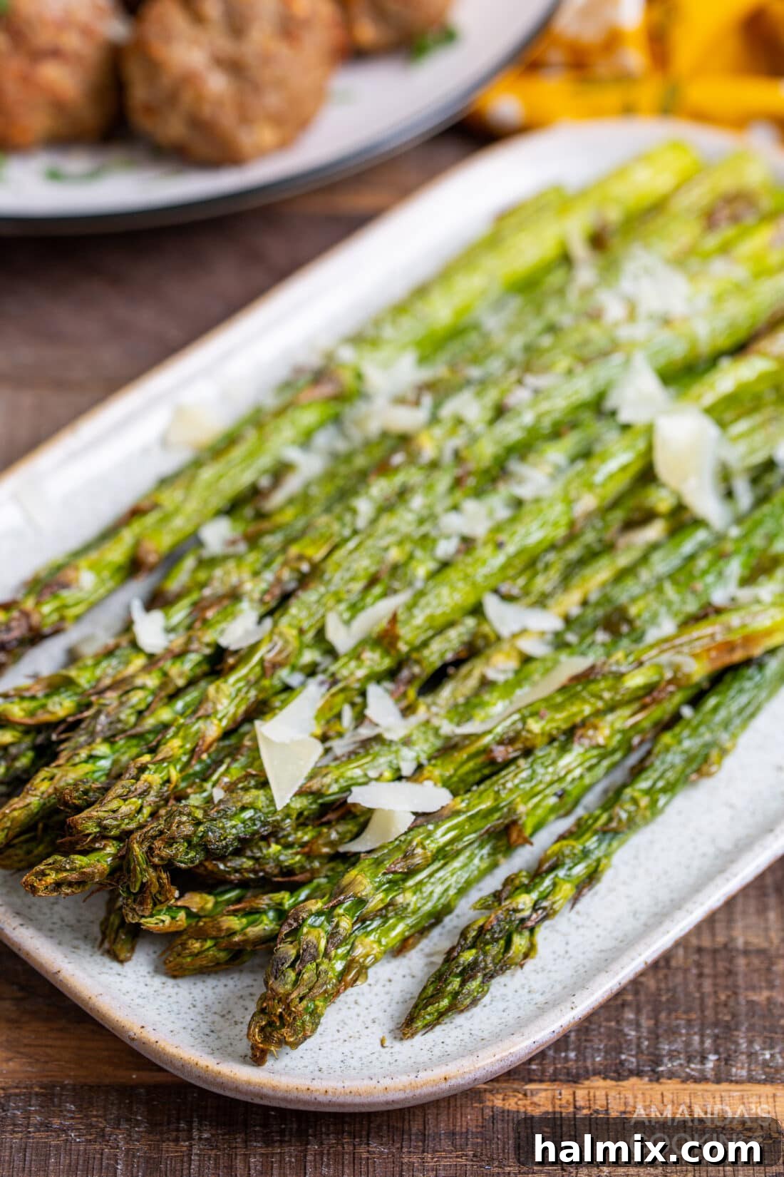 perfectly cooked asparagus spears on a plate, ready to be served