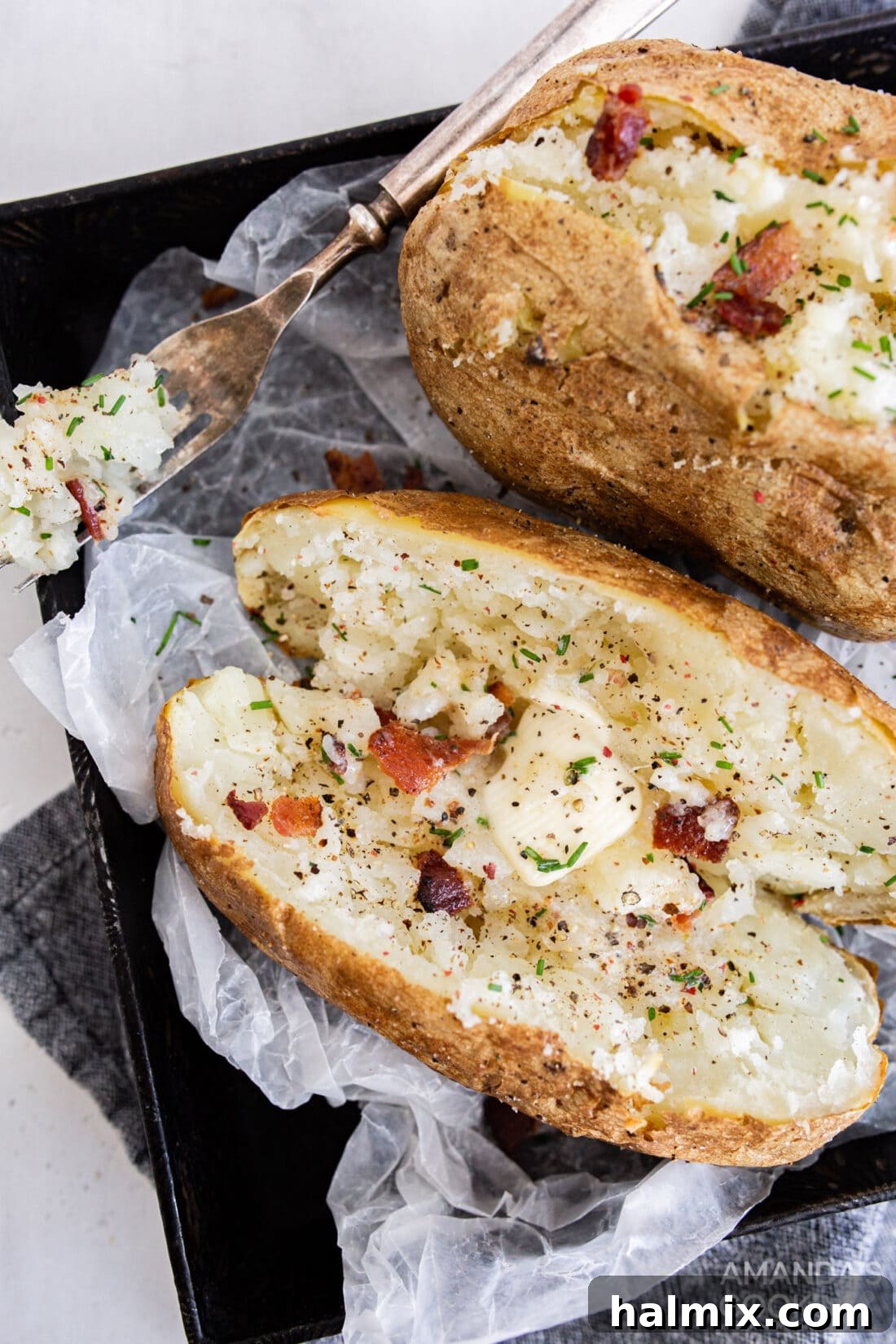 baked potato with butter and bacon