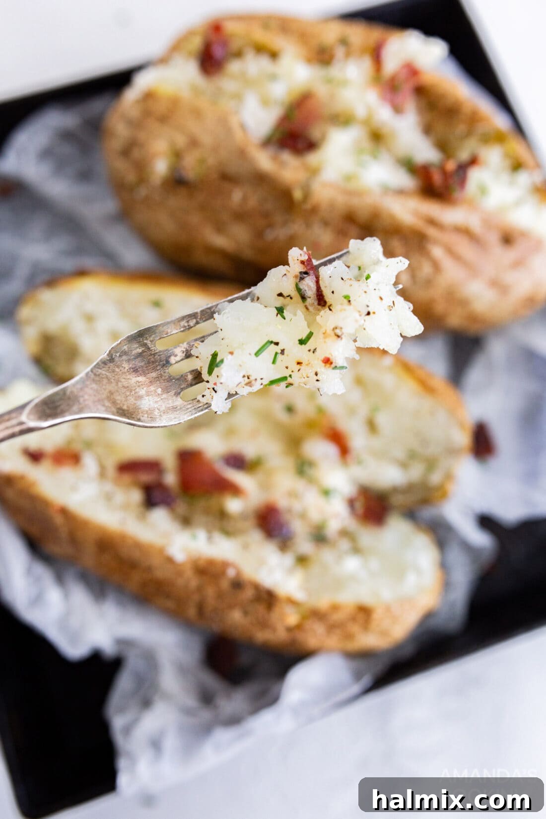 fork full of air fryer baked potato