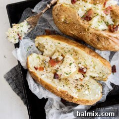 air fryer baked potatoes on a plate