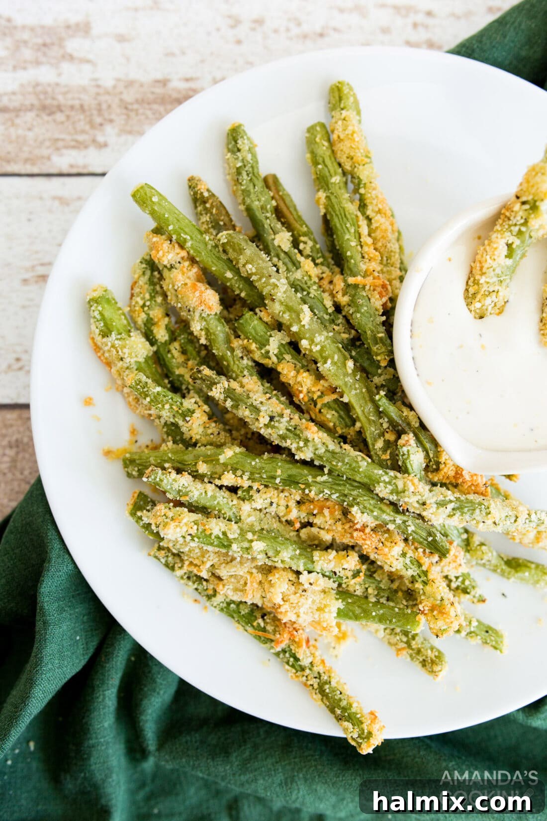Air Fryer Green Bean Snaps 2 Air Fryer Green Bean Fries on a plate with dip
