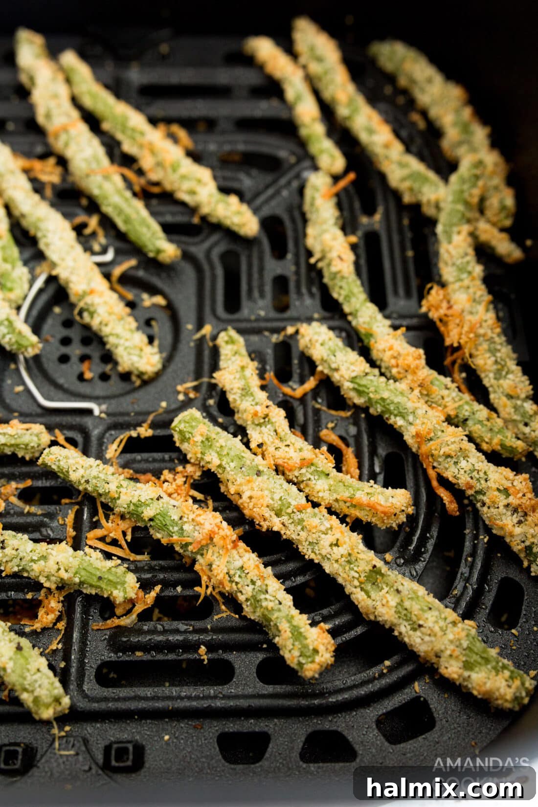 Air Fryer Green Bean Snaps 3 Air Fryer Green Bean Fries in an air fryer basket