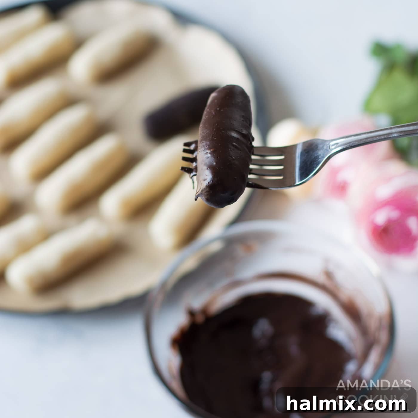 Irresistible Homemade Bounty Bars 8 fork holding homemade bounty bar