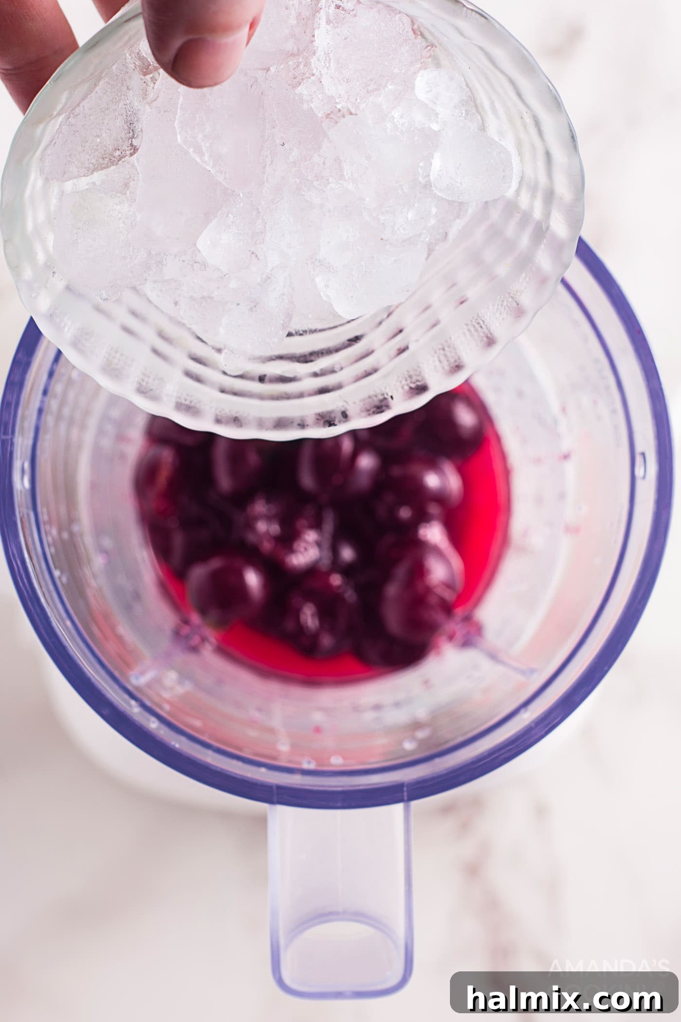 cherries and sparkling water in blender