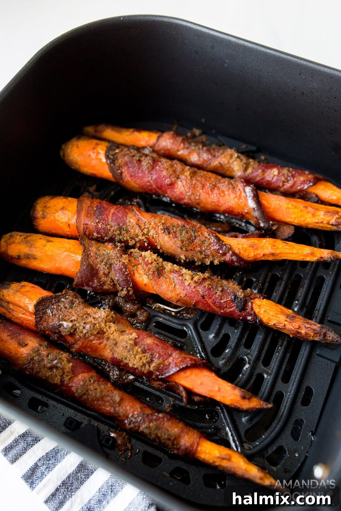 bacon wrapped carrots in the air fryer basket